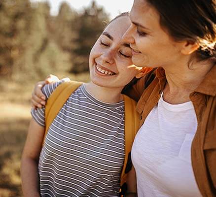 mother and daughter hugging